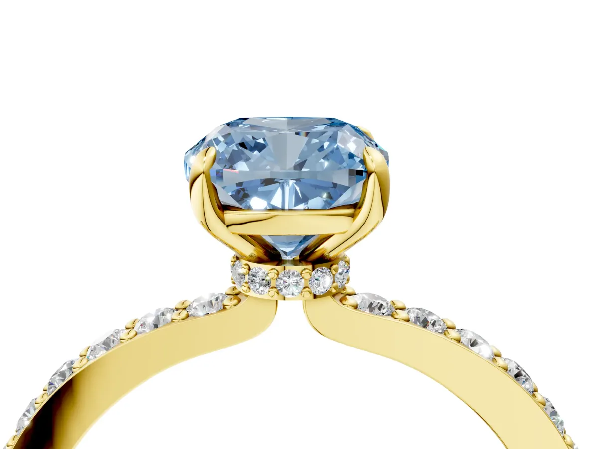 Fancy Blue Cushion Cut Diamond Solitaire Engagement Ring with Pavé Band and Four-Prong Setting Yellow gold