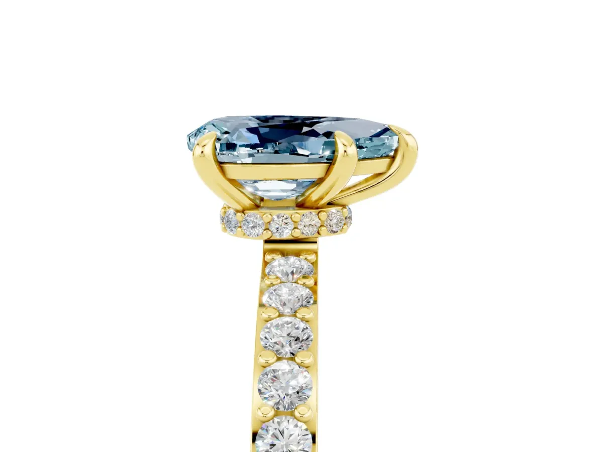 Pear Cut Aquamarine Solitaire Engagement Ring with Pavé Band and Four-Prong Setting Yellow gold