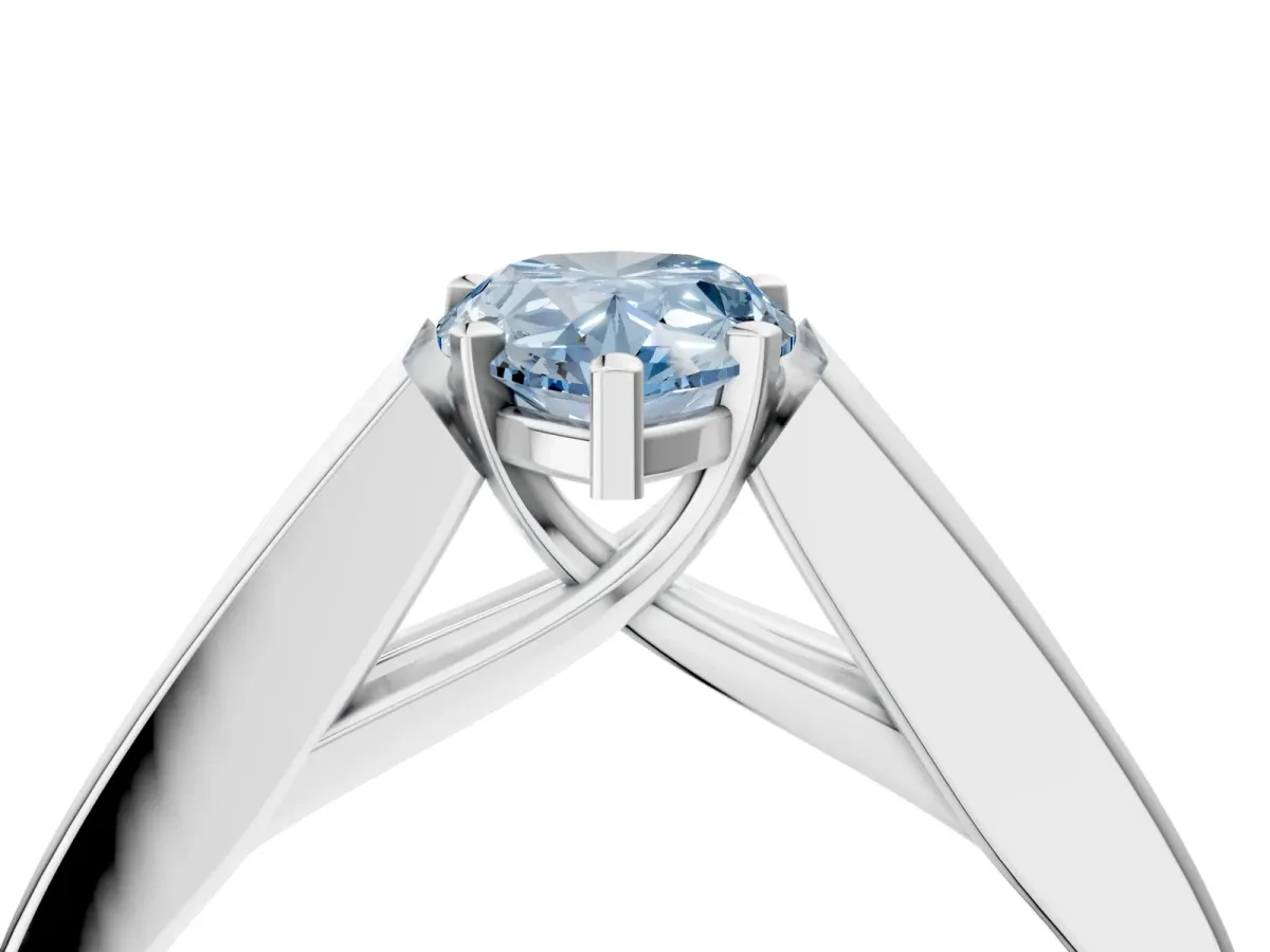 Fancy Blue Pear Cut Cut Channel Set Solitaire Ring with Four-Prong Setting White gold