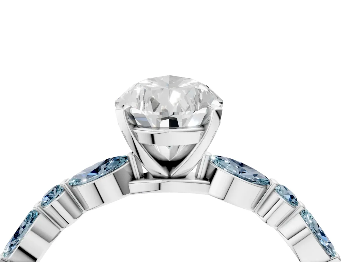 Pear Cut Diamond Ring with Marquise and Round Aquamarine Side Stones and Four-Prong Setting White gold