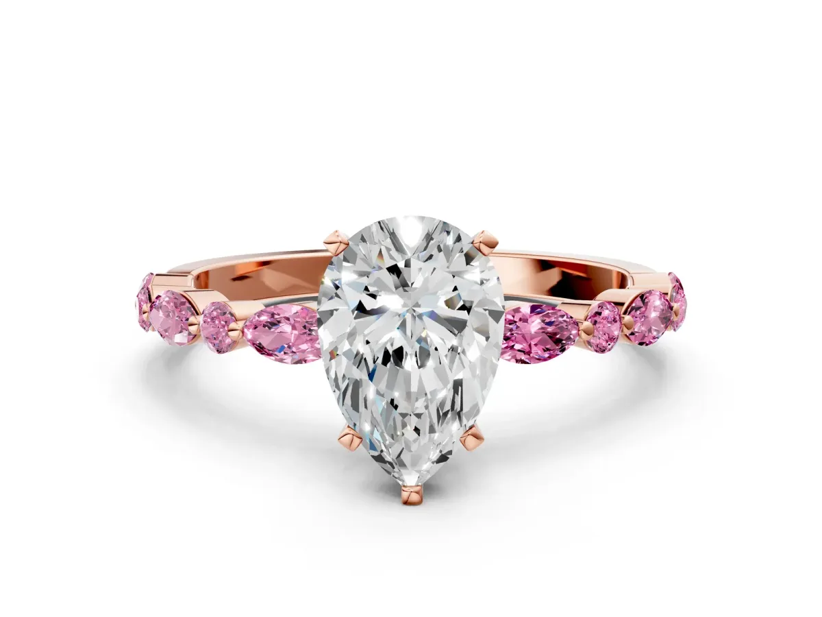 Pear Cut Diamond Ring with Marquise and Round Pink Sapphire Side Stones and Four-Prong Setting Rose gold