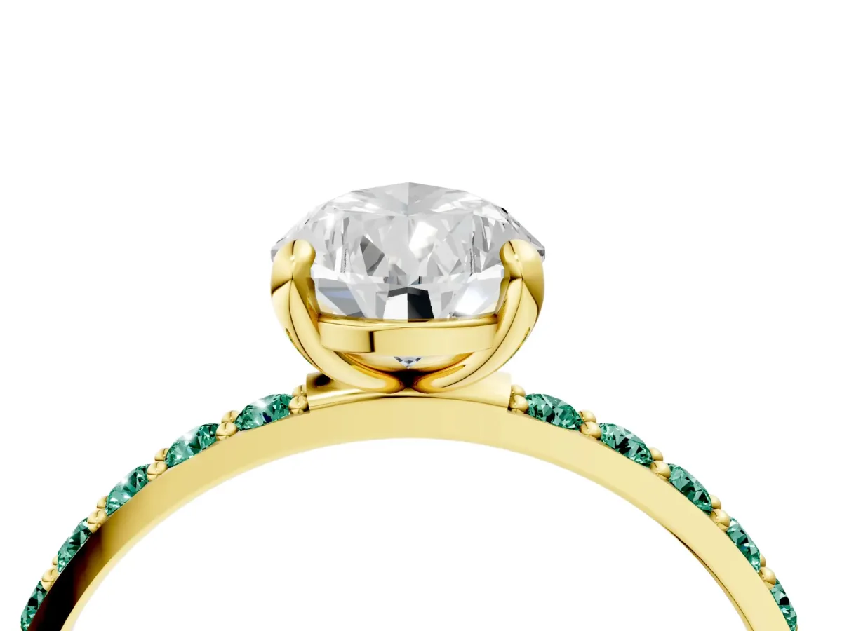 Pear Cut Diamond Solitaire Ring with Round Green Sapphire Pavé Band and Prong Setting Yellow gold