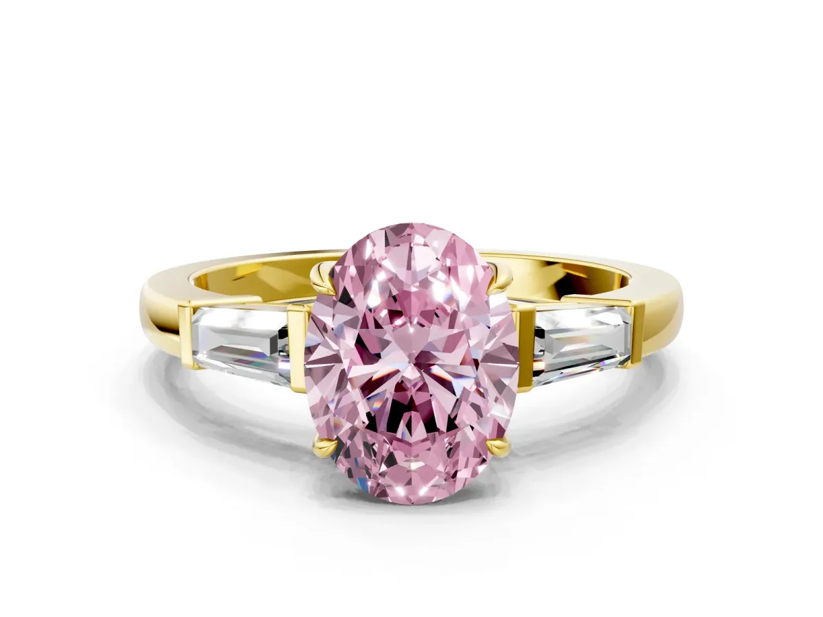 Fancy Pink Oval Cut Diamond Three-Stone Ring with Tapered Baguette Side Stones and Prong Setting Yellow gold