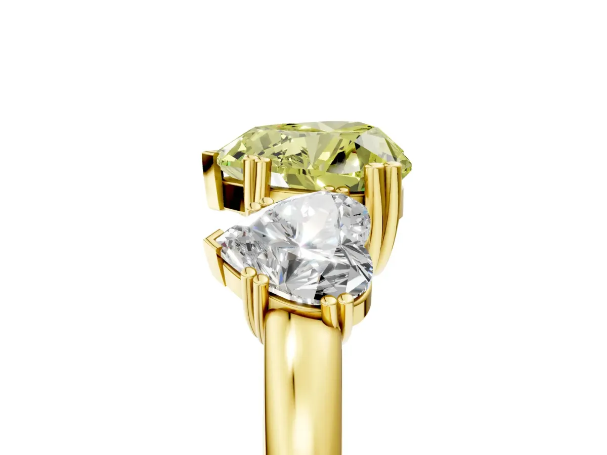 Fancy Yellow Three-Stone Heart Cut Cut Diamond Ring with Channel Set Band and Four-Prong Setting Yellow gold