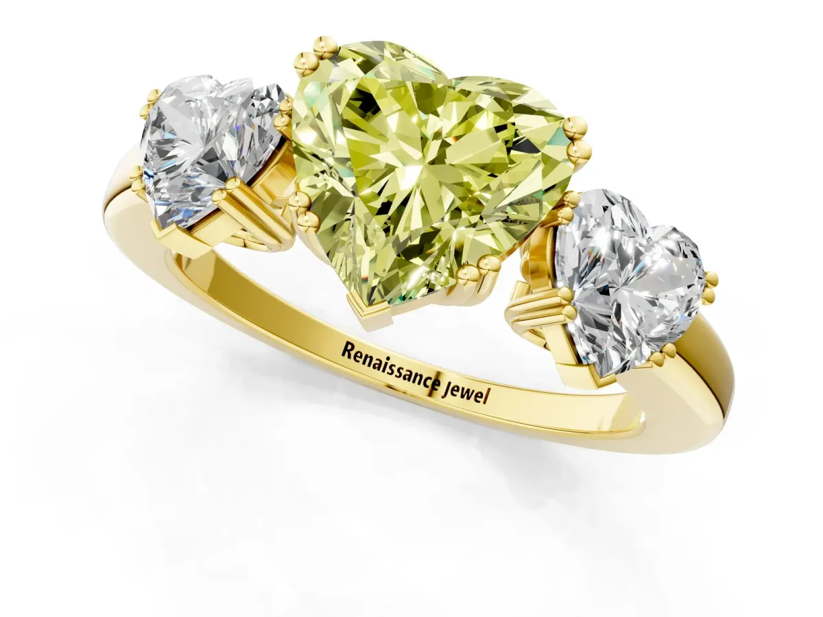 Fancy Yellow Three-Stone Heart Cut Cut Diamond Ring with Channel Set Band and Four-Prong Setting Yellow gold