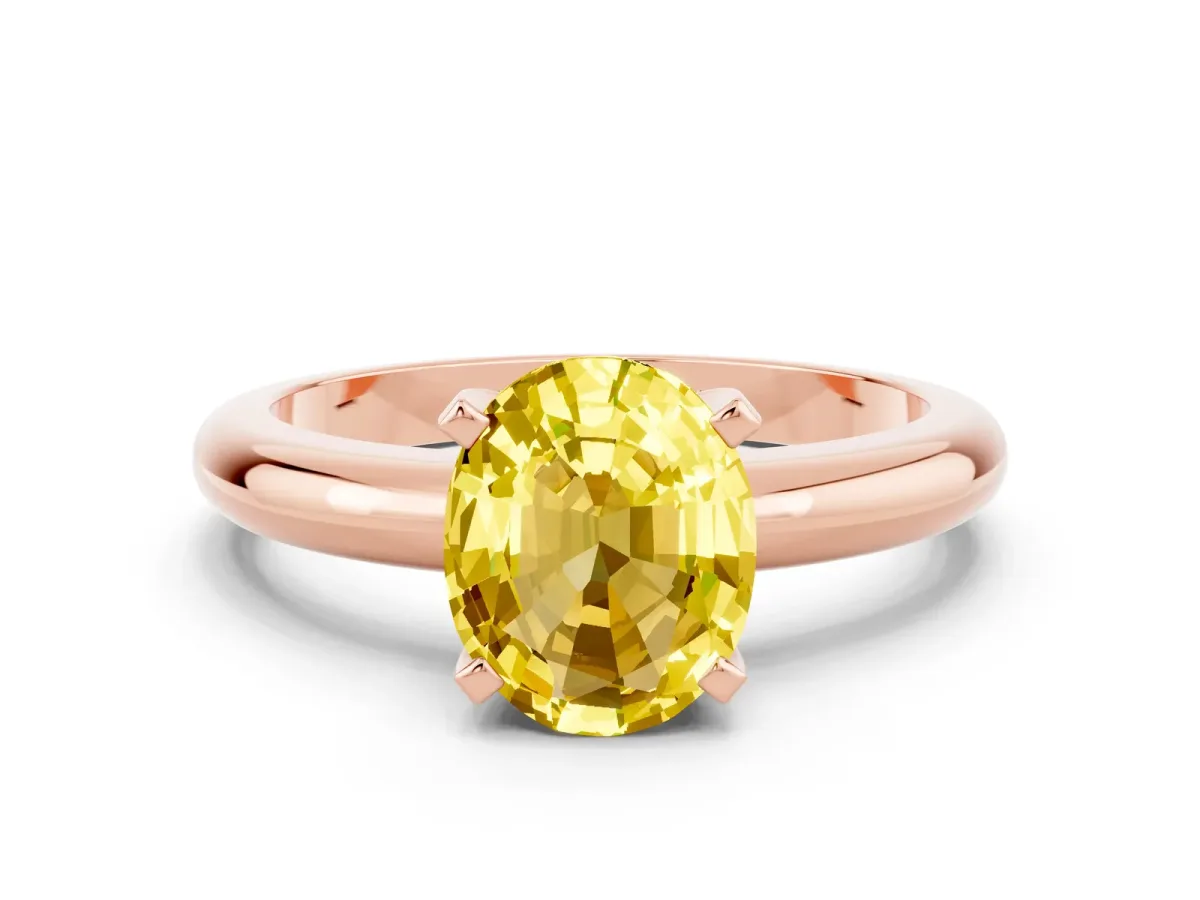 Oval Cut Yellow Sapphire Solitaire Engagement Ring with Round Band and Four-Prong Setting Rose gold