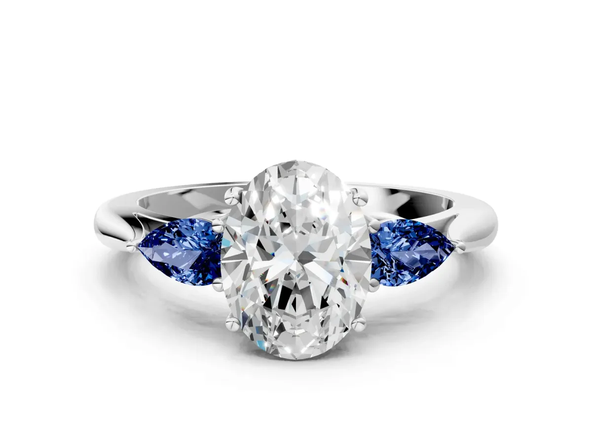Oval Cut Diamond Three-Stone Ring with Pear Blue Sapphire Side Stones and Prong Setting Silver