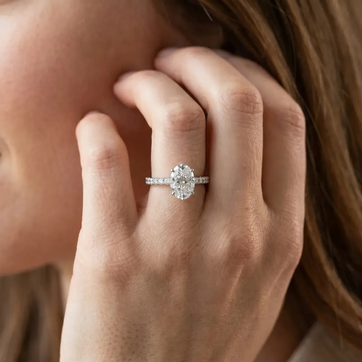Oval Cut Diamond Solitaire Pavé Band with Four-Prong Setting Silver