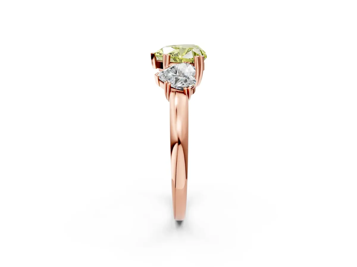 Fancy Yellow Three-Stone Heart Cut Cut Diamond Ring with Channel Set Band and Four-Prong Setting Rose gold