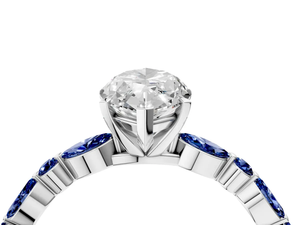 Marquise Cut Diamond Ring with Marquise and Round Blue Sapphire Side Stones and Four-Prong Setting Platinum
