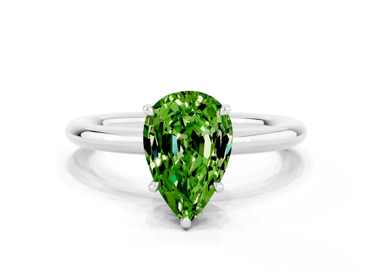 Pear Cut Peridot Solitaire Ring with Thin Band and Four-Prong Setting Silver