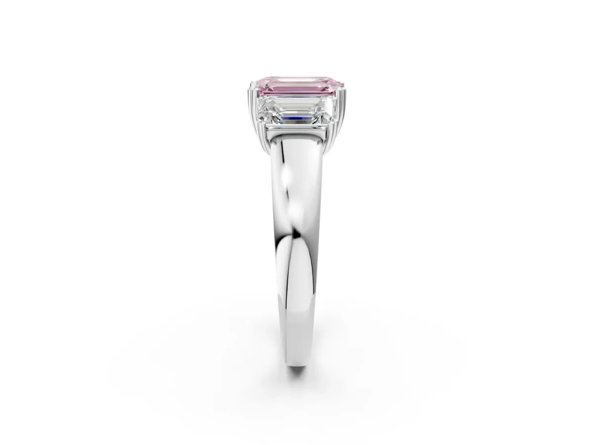 Fancy Pink Three-Stone Emerald Cut Cut Diamond Ring with Channel Set Band and Four-Prong Setting Platinum