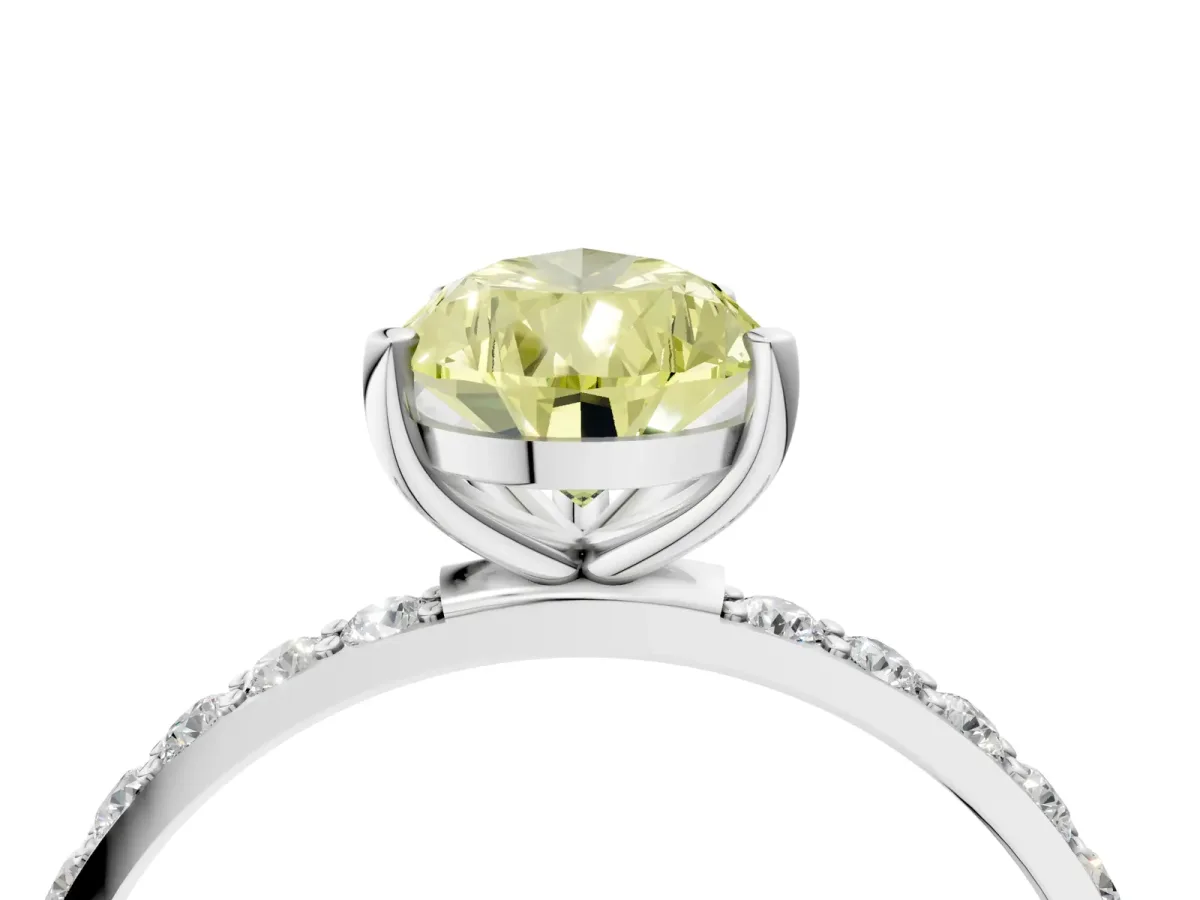 Fancy Yellow Pear Cut Diamond Solitaire Ring with Round Pavé Shoulders and Prong Setting White gold