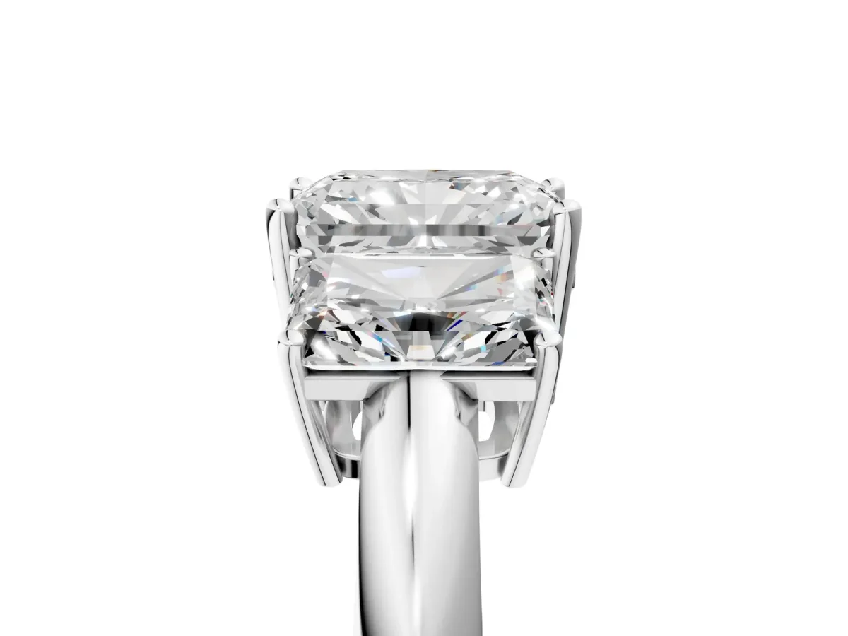 Three-Stone Radiant Cut Cut Diamond Engagement Ring with Prong Setting on a White Gold Band Silver