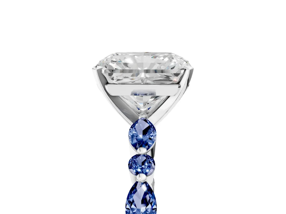 Radiant Cut Diamond Ring with Marquise and Round Blue Sapphire Side Stones and Four-Prong Setting Platinum