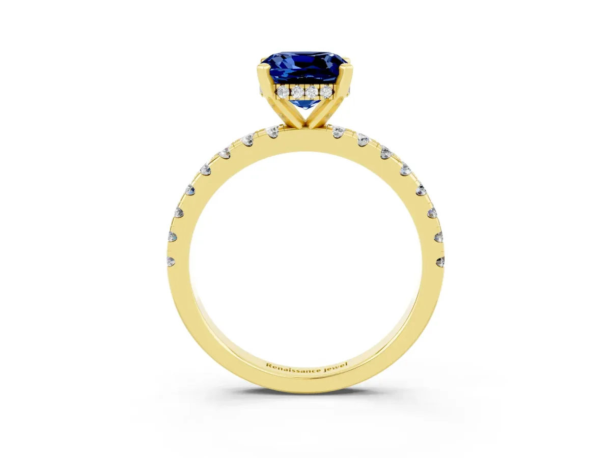 Cushion Cut Blue Sapphire Solitaire Ring with Round Pavé Band and Four-Prong Setting Yellow gold