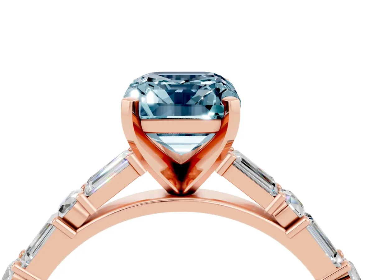 Emerald Cut Aquamarine Solitaire with Side Baguettes and Channel Set Band Rose gold