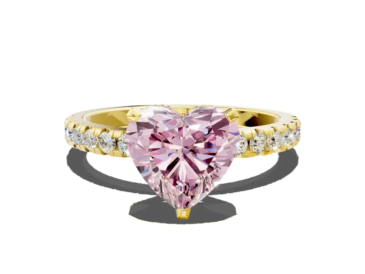 Fancy Pink Heart Cut Diamond Solitaire Ring with Round Pavé Band and Four-Prong Setting Yellow gold