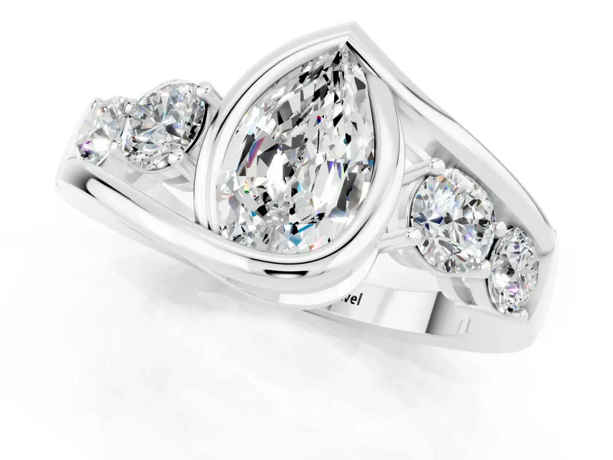 Bezel Set Pear Cut Moissanite Bypass Ring with Round Accents Platinum