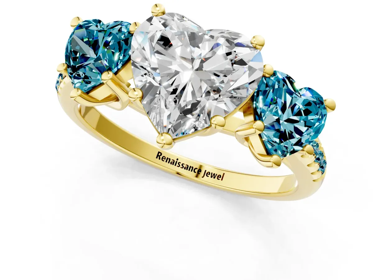 Three-Stone Heart Cut Diamond Ring with Round Blue Topaz Pavé Band and Prong Setting Yellow gold