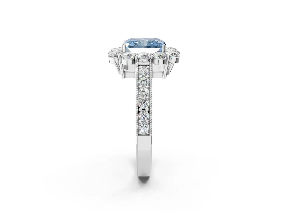 Fancy Blue Radiant Cut Cut Halo Diamond Pavé Engagement Ring with Milgrain Detailing Platinum