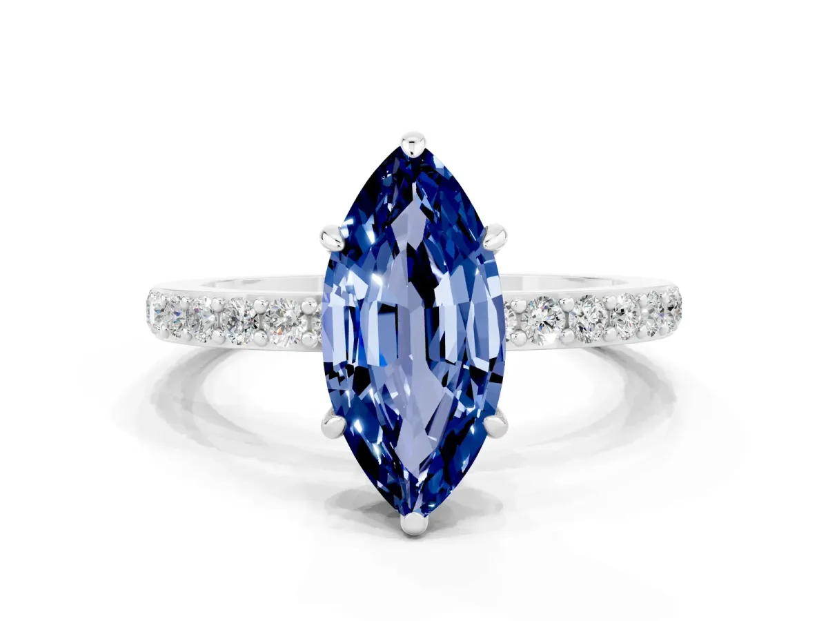 Marquise Cut Blue Sapphire Solitaire Engagement Ring with Pavé Band and Four-Prong Setting White gold