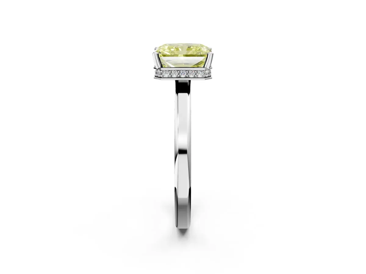 Fancy Yellow Radiant Cut Cut Solitaire Engagement Ring with Four-Prong Setting on a Classic Band Platinum