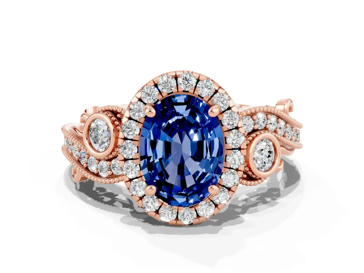 Oval Cut Blue Sapphire Halo Ring with Milgrain Pavé Band and Four-Prong Setting Rose gold