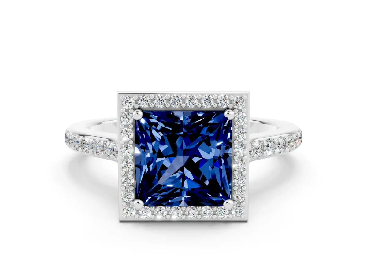 Princess Cut Blue Sapphire Halo Engagement Ring with Round Pavé Shoulders and Prong Setting Silver