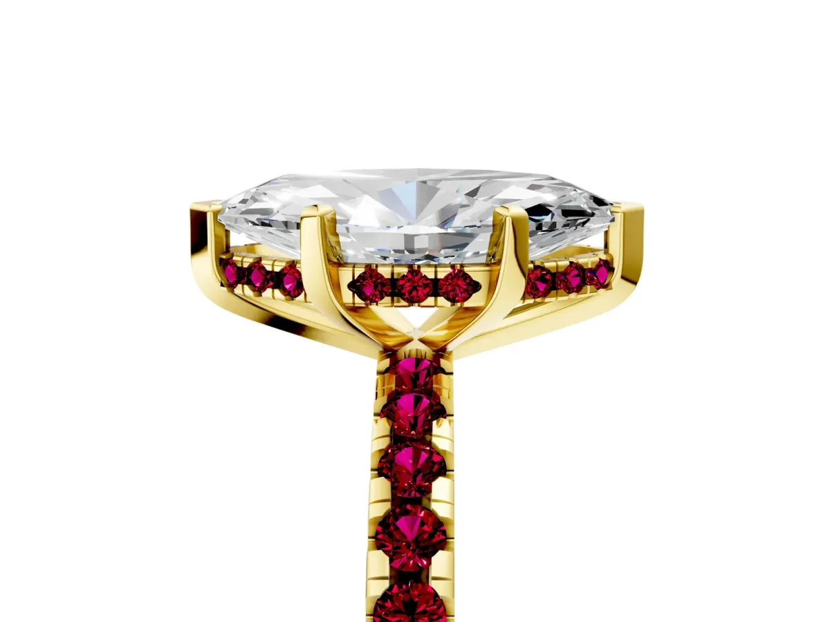 Marquise Cut Diamond Solitaire Ring with Round Garnet Pavé Band and Four-Prong Setting Yellow gold