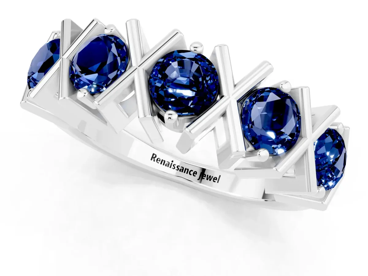 Round Blue Sapphire Channel Set Band with X-Prong Detail White gold