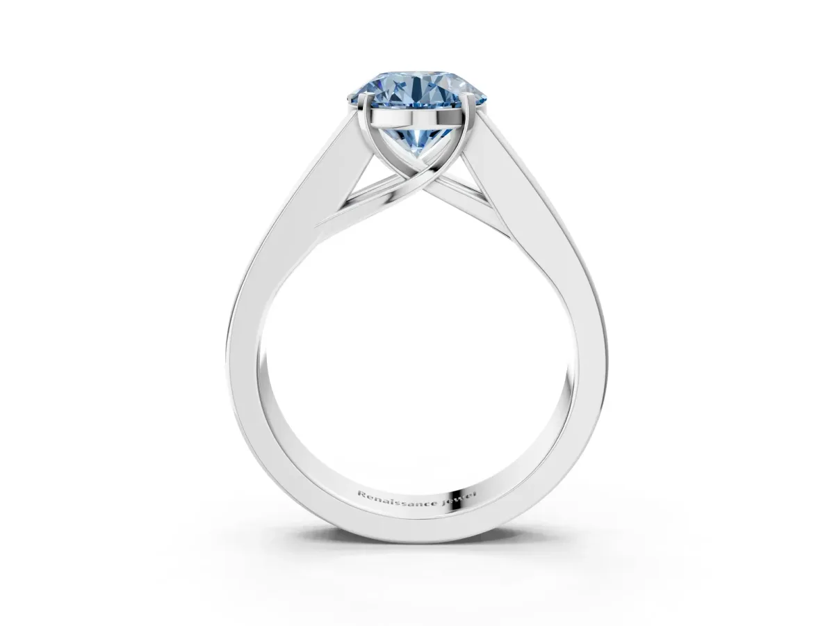 Fancy Blue Round Cut Cut Channel Set Solitaire Ring with Four-Prong Setting Silver