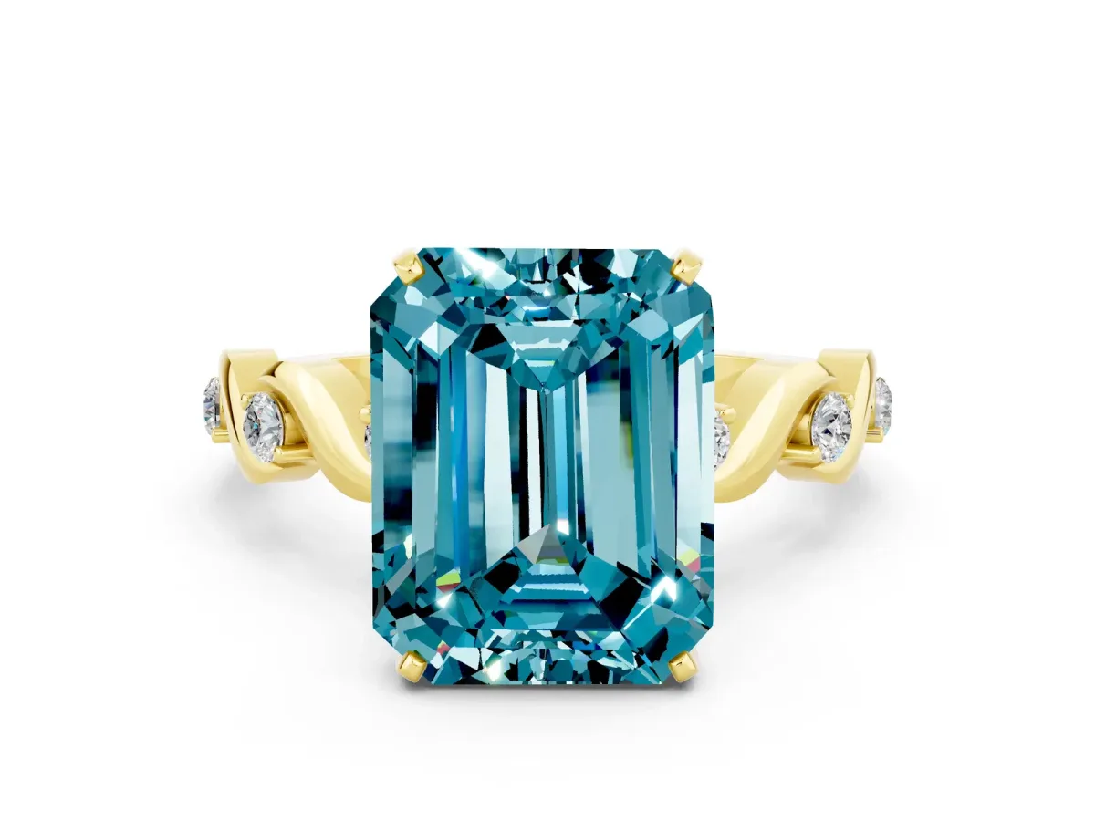 Emerald Cut Blue Topaz Solitaire Twisted Band with Round Accents and Prong Setting Yellow gold