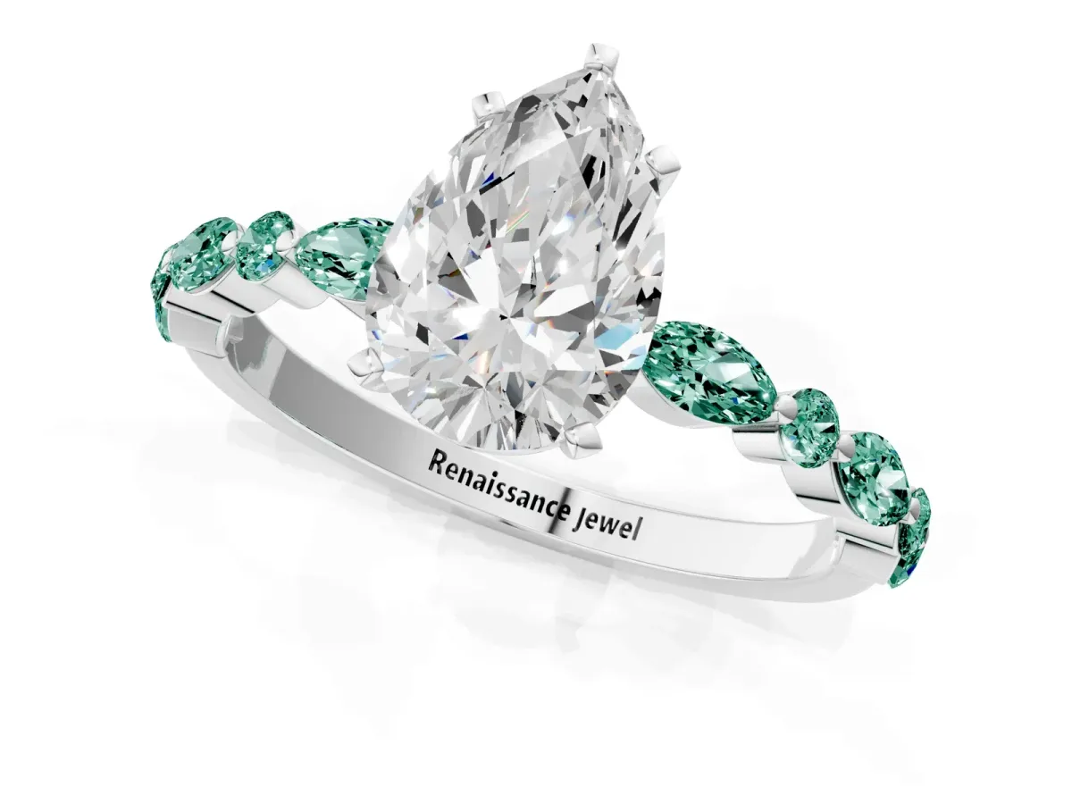 Pear Cut Diamond Ring with Marquise and Round Green Sapphire Side Stones and Four-Prong Setting White gold