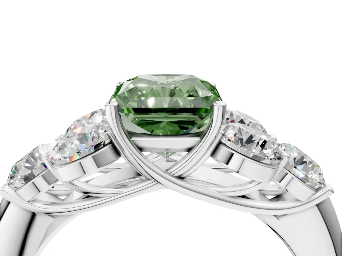 Fancy Green Radiant Cut Cut Diamond Cluster Ring with Round Accent Stones and Prong Setting on a Classic Band Platinum