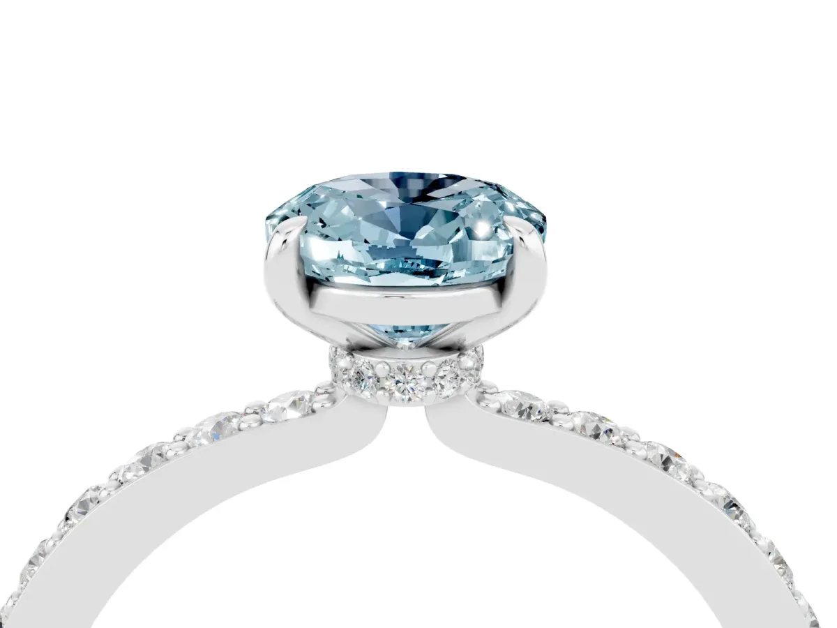 Oval Cut Aquamarine Solitaire Engagement Ring with Pavé Band and Four-Prong Setting White gold