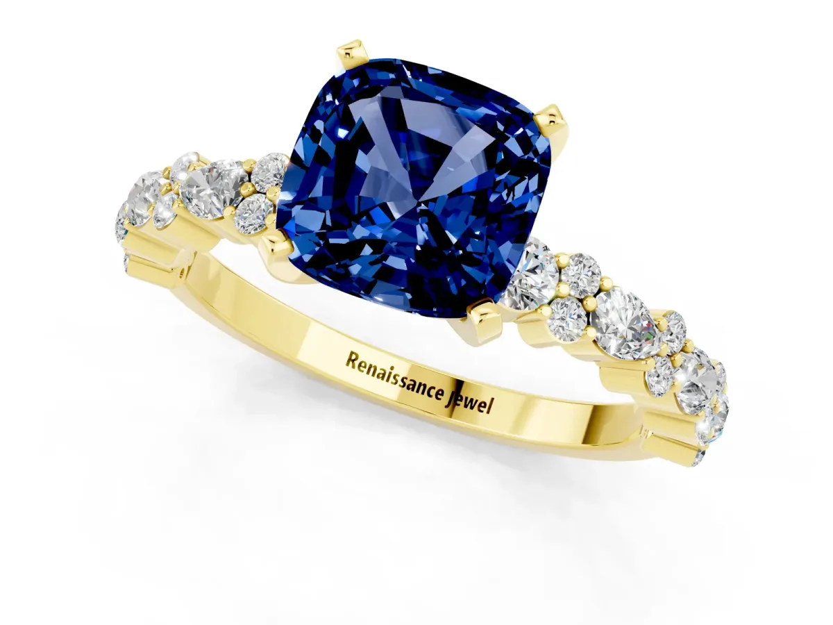 Cushion Cut Blue Sapphire Side Stone Solitaire Ring with Round and Four-Prong Setting Yellow gold