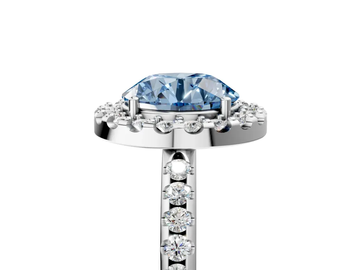 Fancy Blue Round Cut Diamond Pavé Halo Ring with Four-Prong Setting Platinum