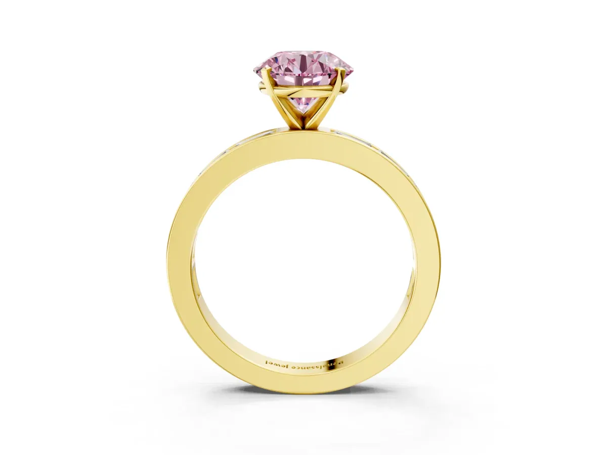 Fancy Pink Round Cut Solitaire Diamond Ring with Channel-Set Baguette Band and Four-Prong Setting Yellow gold