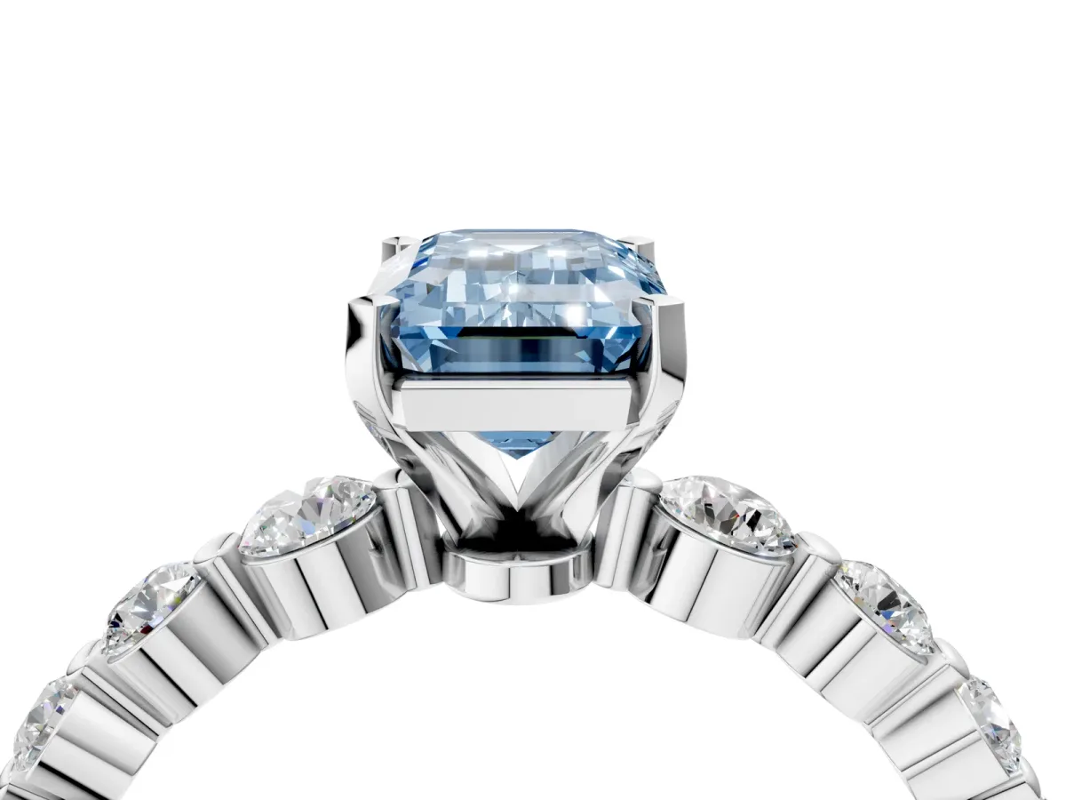 Fancy Blue Emerald Cut Solitaire Diamond Ring with Pave Band and Four-Prong Setting Silver