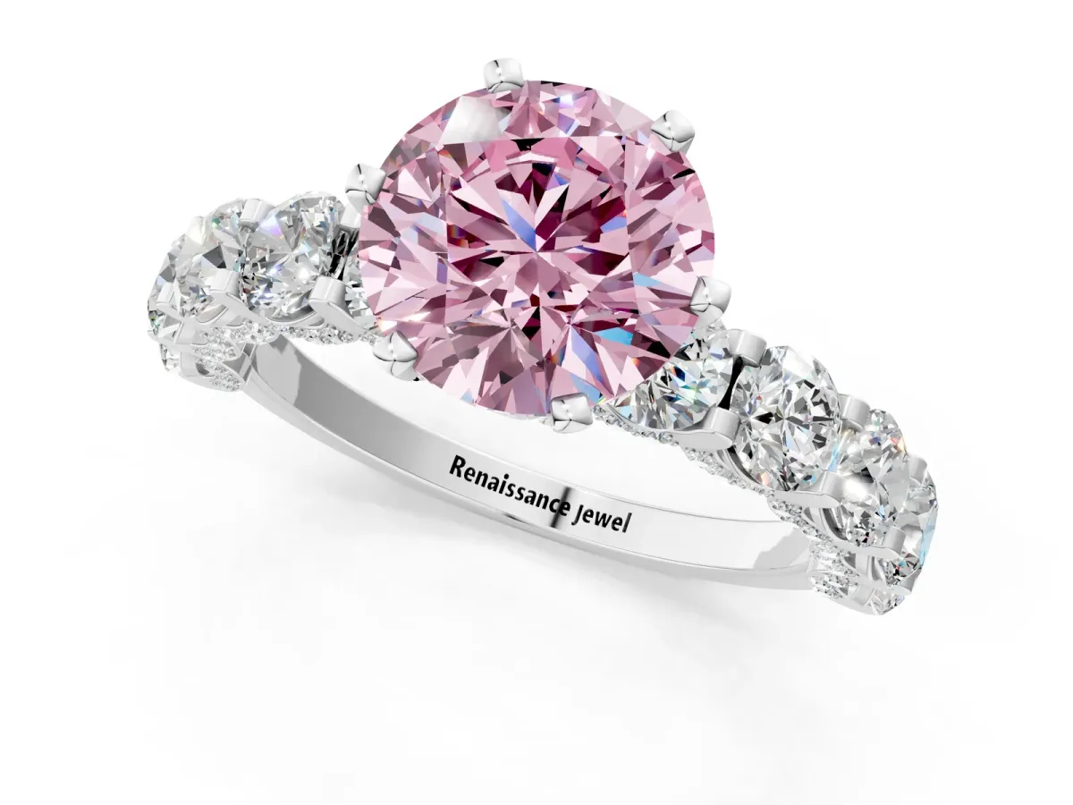 Fancy Pink Round Cut Diamond Side Stone Engagement Ring with Four-Prong Setting Silver