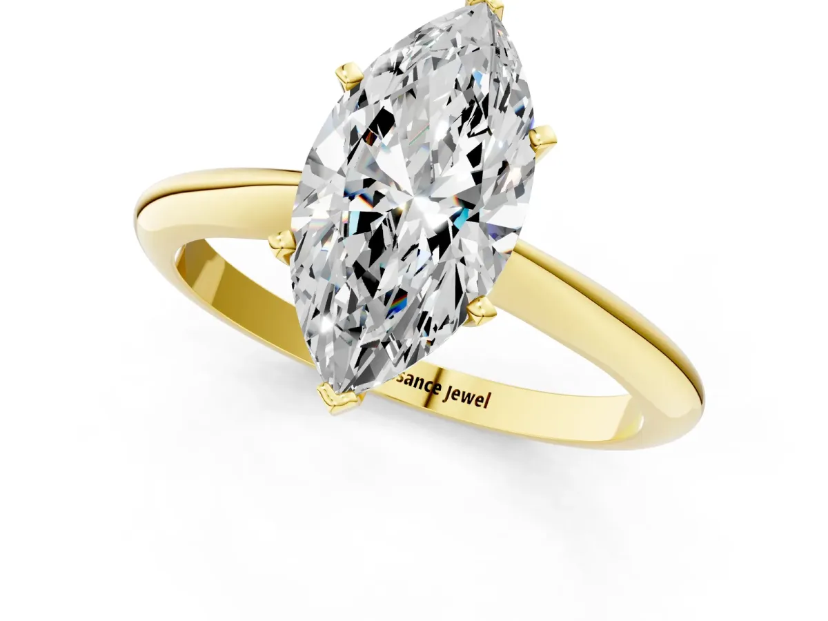 Marquise Cut Diamond Solitaire Engagement Ring with Classic Band and Four-Prong Setting Yellow gold