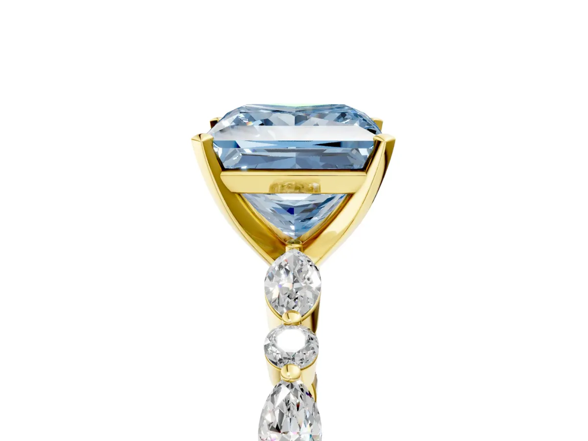 Fancy Blue Princess Cut Diamond Ring with Marquise and Round Side Stones and Four-Prong Setting Yellow gold