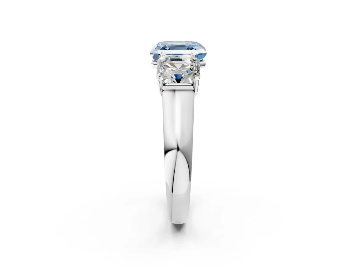 Fancy Blue Asscher Cut Three-Stone Diamond Ring with Prong Setting on a Classic Band Platinum