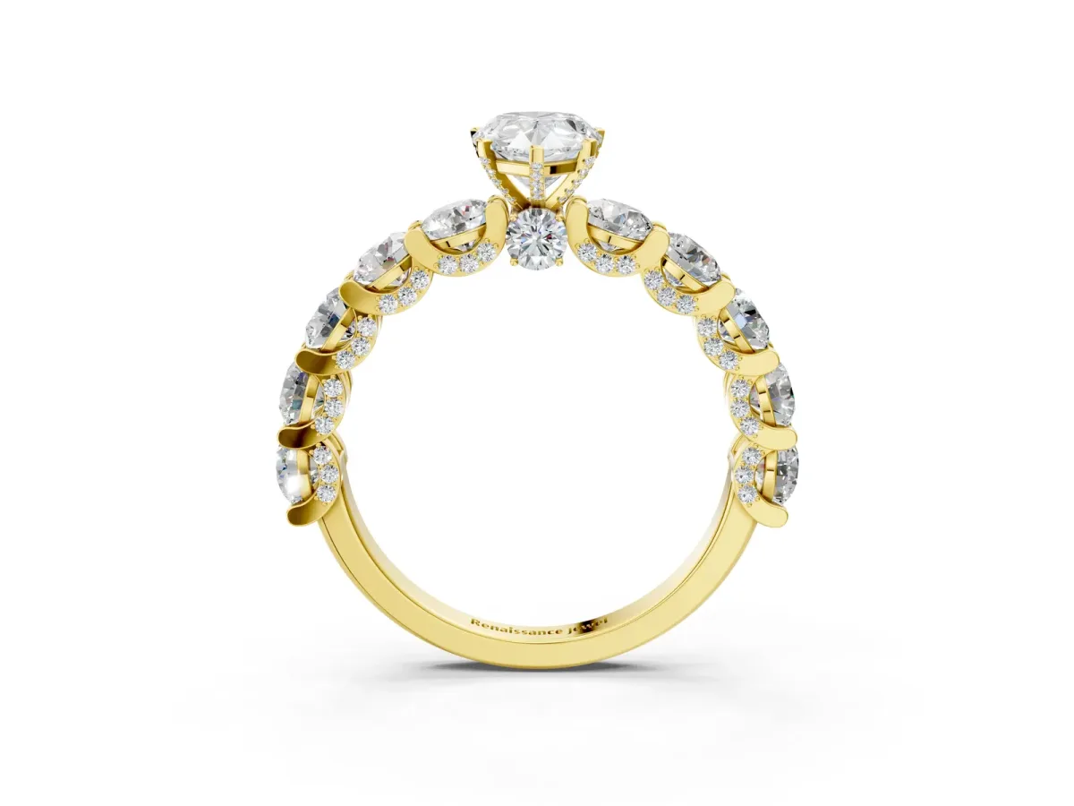 Pear Cut Diamond Side Stone Engagement Ring with Four-Prong Setting Yellow gold