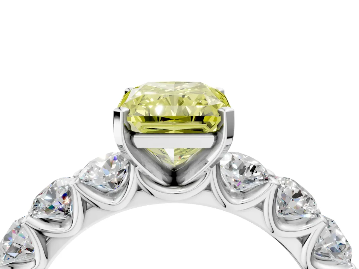 Fancy Yellow Radiant Cut Diamond Prong Setting with Side Stones on a Pave Band Silver