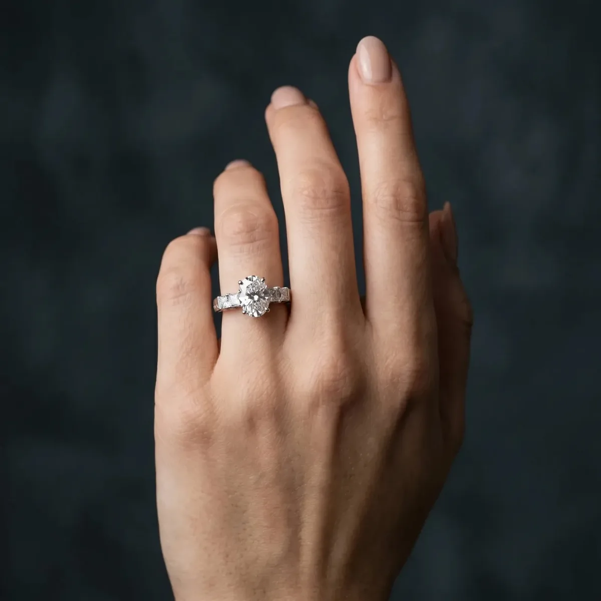 Oval Cut Solitaire Princess Side Stone Engraved Band Prong Setting Ring White gold