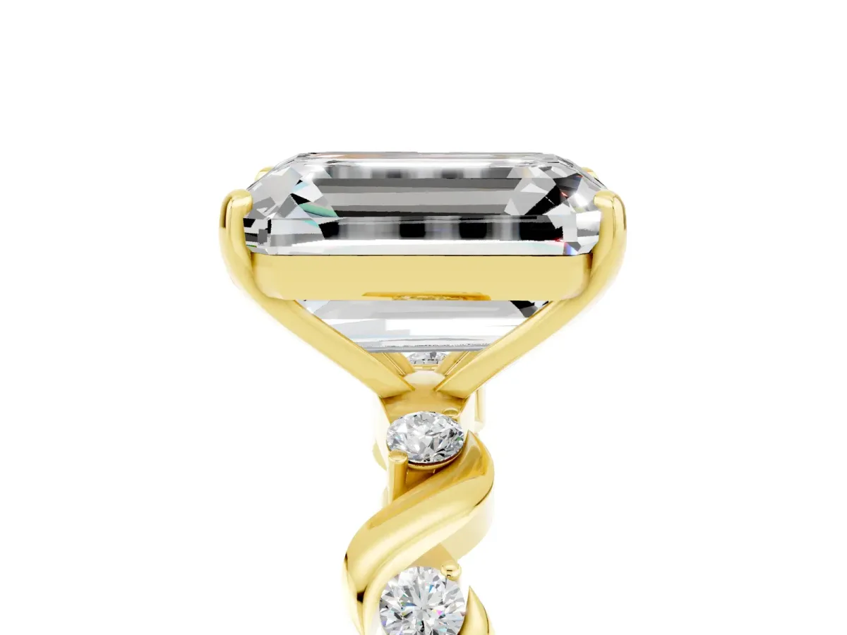 Emerald Cut Moissanite Solitaire Twisted Band with Round Accents and Prong Setting Yellow gold