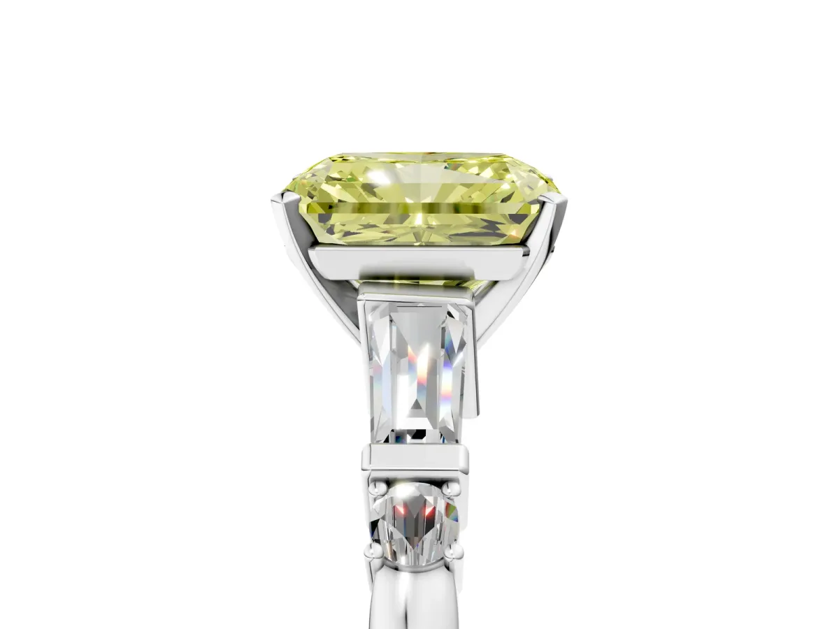 Fancy Yellow Radiant Cut Cut Diamond Ring with Baguette Side Stones, Channel Set Band, and Four-Prong Setting Platinum