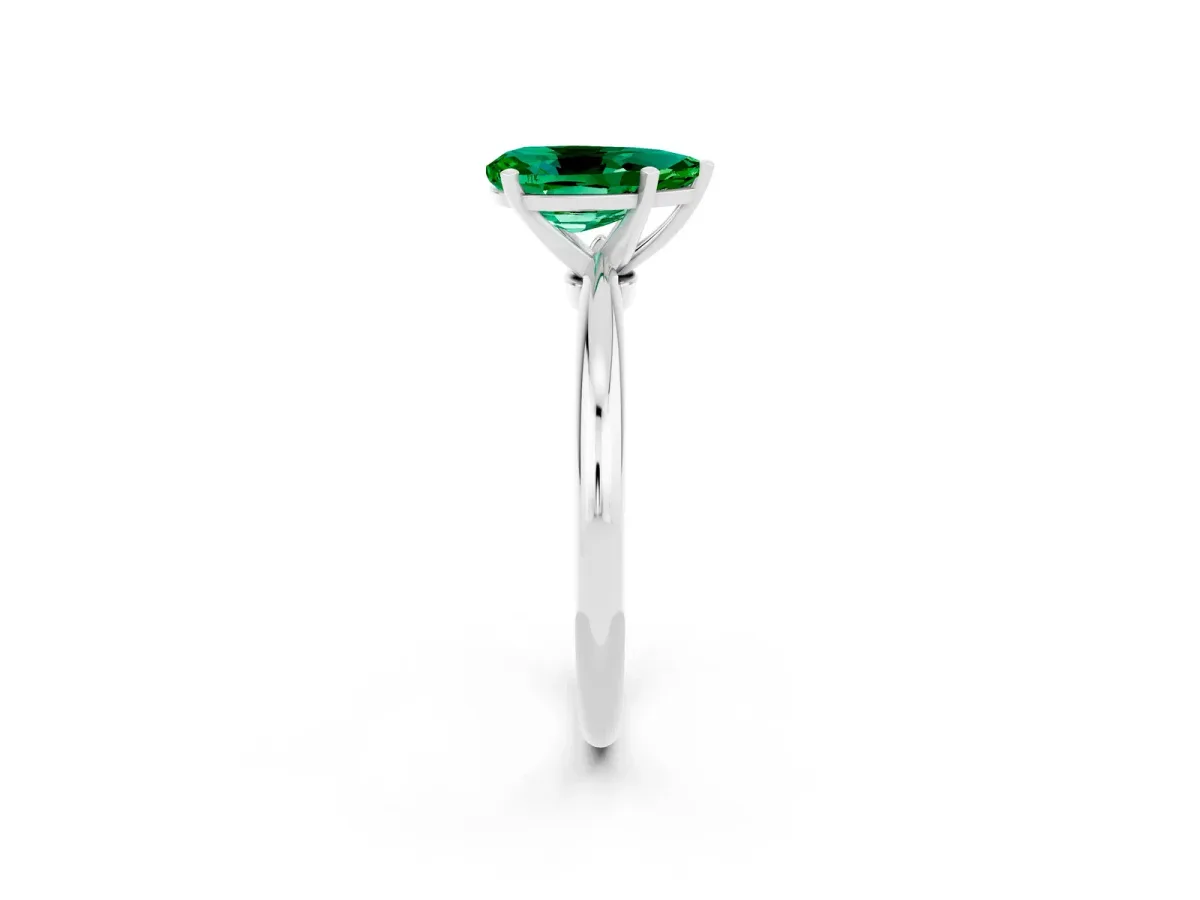Pear Cut Emerald Solitaire Ring with Six-Prong Setting and Classic Band Silver